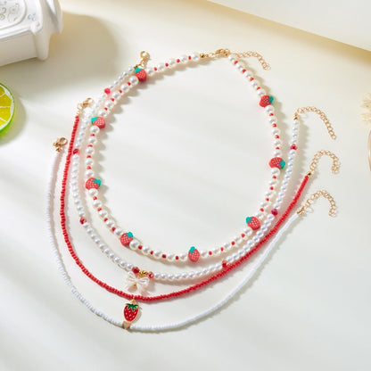 Strawberry Pendant Necklace – Delicate Rice Bead Clavicle Chain with Sweet Starfish and Cherry Details for Women, Beach Parties and Gifts