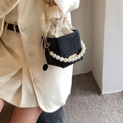 PU Leather Bucket Bag – Vintage Drawstring Crossbody Purse with Pearl Detail and Chain Strap for Women, Shoulder Carry and Everyday Style